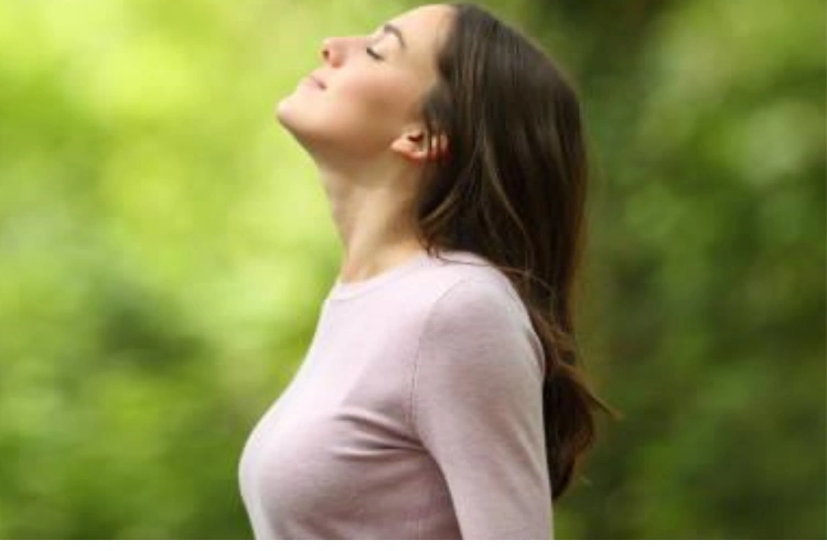 Woman Enjoying Fresh Air Outdoors
