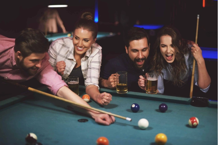 Friends playing pool